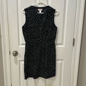 Black and white polka dot sleeveless dress